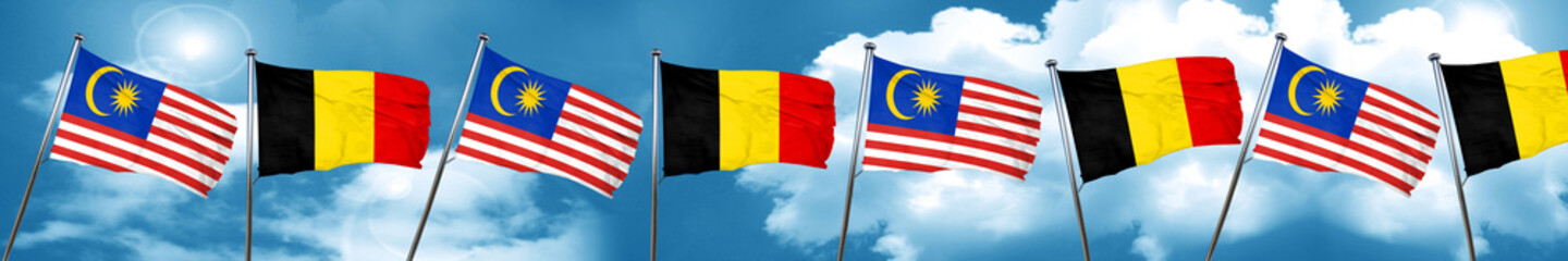 Malaysia flag with Belgium flag, 3D rendering