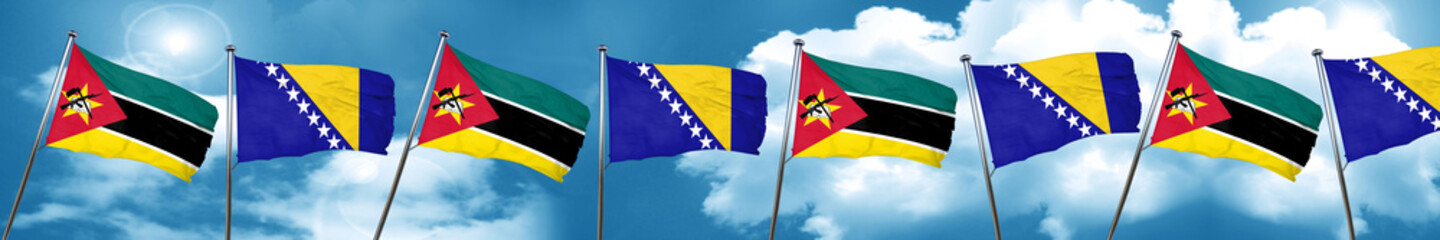 Fototapeta na wymiar Mozambique flag with Bosnia and Herzegovina flag, 3D rendering