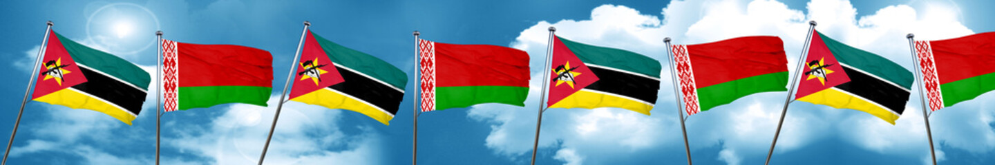 Mozambique flag with Belarus flag, 3D rendering