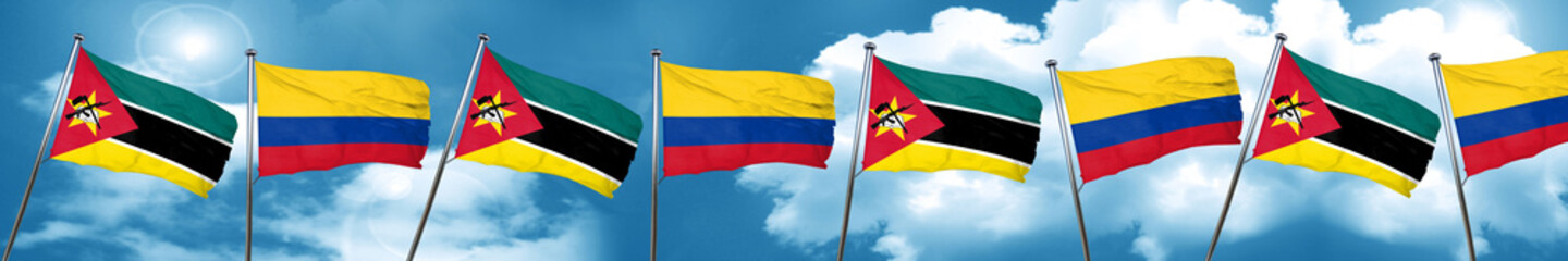 Mozambique flag with Colombia flag, 3D rendering