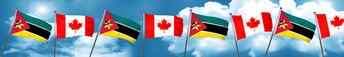 Mozambique flag with Canada flag, 3D rendering
