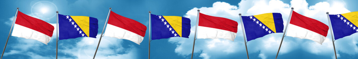 monaco flag with Bosnia and Herzegovina flag, 3D rendering