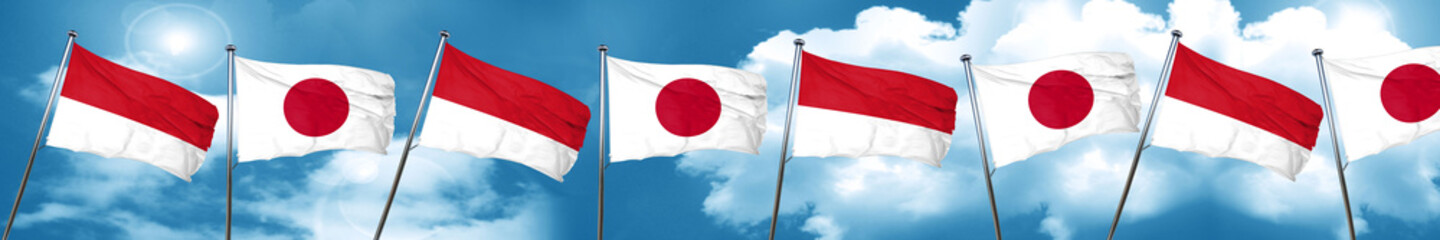 monaco flag with Japan flag, 3D rendering