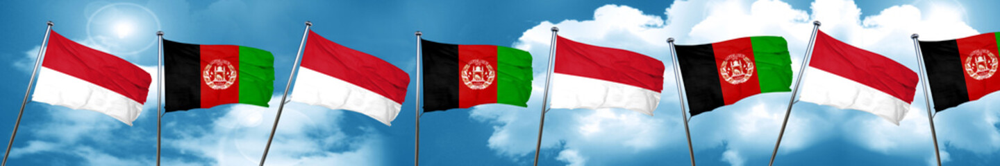 monaco flag with afghanistan flag, 3D rendering