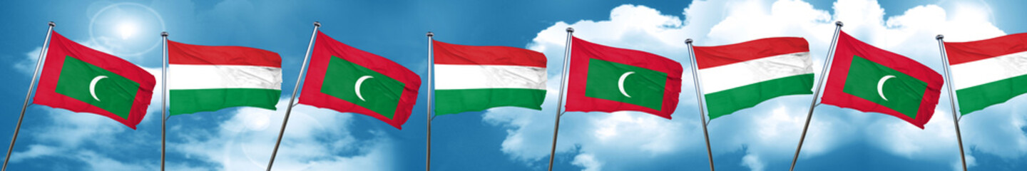 Maldives flag with Hungary flag, 3D rendering