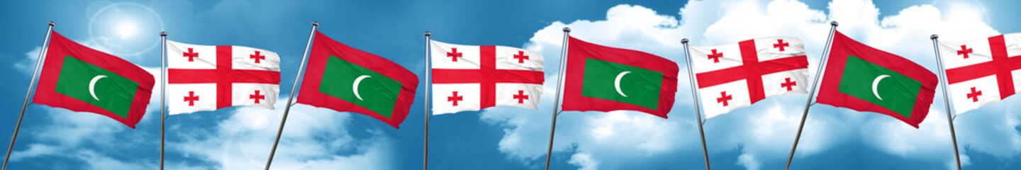 Maldives flag with Georgia flag, 3D rendering
