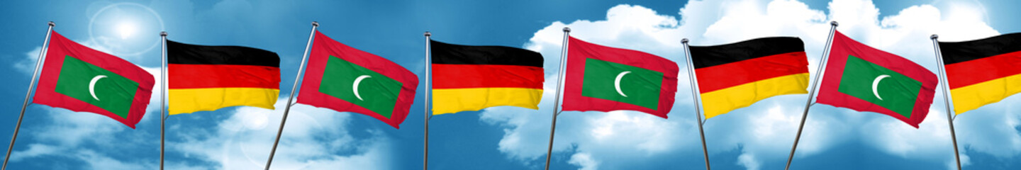 Maldives flag with Germany flag, 3D rendering