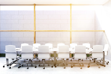 Front view of meeting room with grass, toned