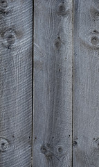 Aged wooden board siding on a building