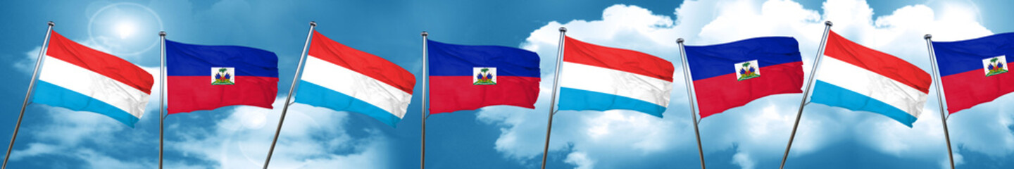 Luxembourg flag with Haiti flag, 3D rendering