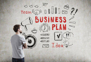 Man in T-shirt and business plan icons
