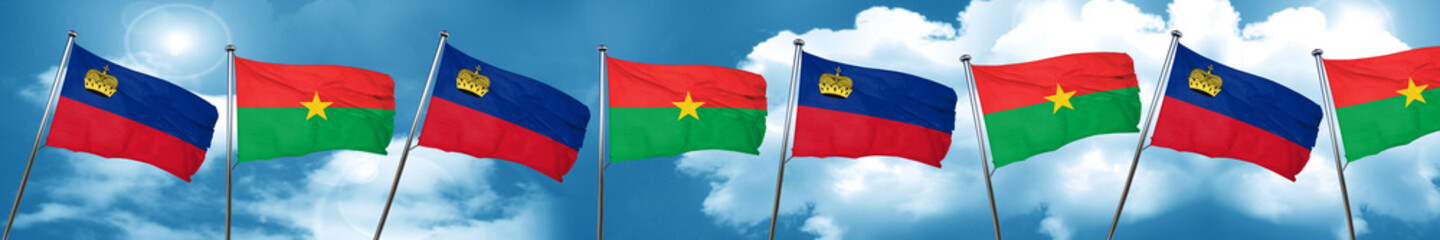 Liechtenstein flag with Burkina Faso flag, 3D rendering