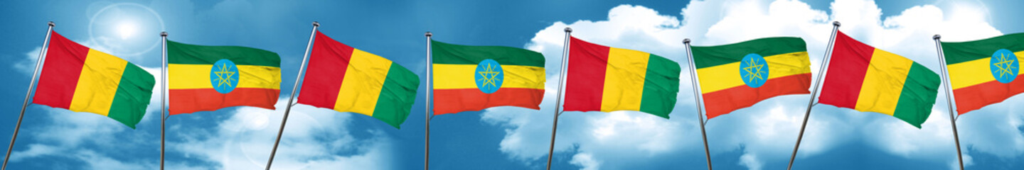 Guinea flag with Ethiopia flag, 3D rendering
