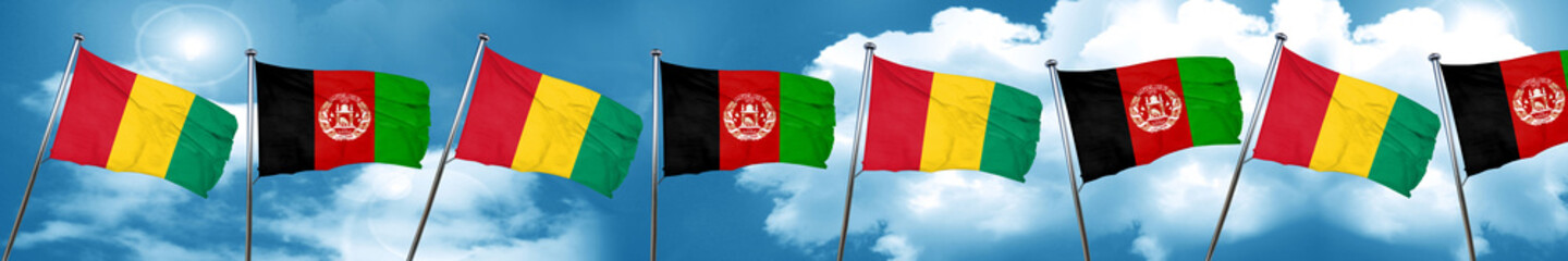 Guinea flag with afghanistan flag, 3D rendering