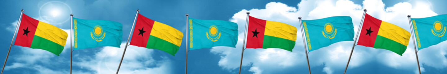 Guinea bissau flag with Kazakhstan flag, 3D rendering
