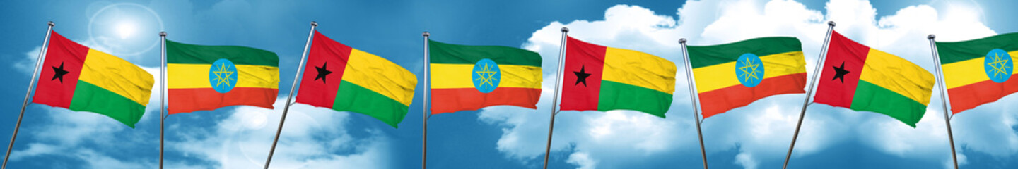 Guinea bissau flag with Ethiopia flag, 3D rendering