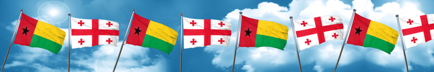 Guinea bissau flag with Georgia flag, 3D rendering