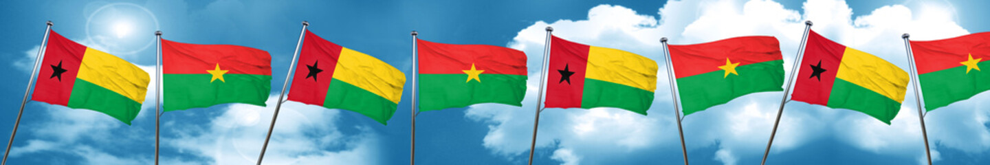Obraz na płótnie Canvas Guinea bissau flag with Burkina Faso flag, 3D rendering