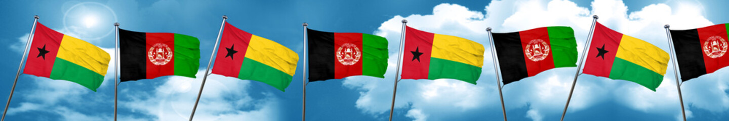 Guinea bissau flag with afghanistan flag, 3D rendering