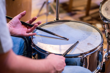 Fototapeta na wymiar Drummer playing the drum