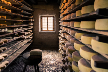 Alpine hut that produces  homemade cheeses.