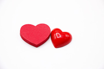 Red hearts are on white background.