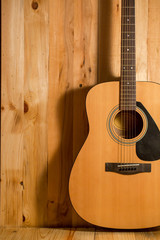 Obraz premium acoustic guitar on wood. background,still life