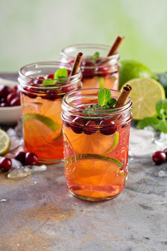 Refreshing winter drink with lime and cranberry