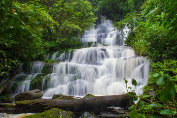Obraz premium beautiful waterfall in rainforest at phu tub berk mountain phet