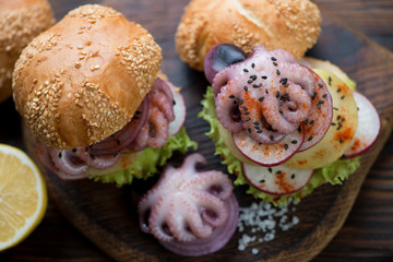 Burgers with pulpo a la gallega, spanish galician dish, close-up