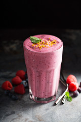Berry smoothie in a tall glass
