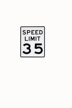 Thirty five mph sign isolated on white