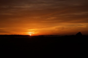 beach and sea at sun rise, sunset 
