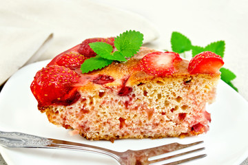 Pie strawberry with jelly on light board