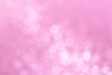 Abstract defocused lights pink tone lights background.