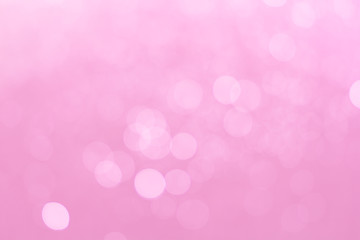 Abstract defocused lights pink tone lights background.