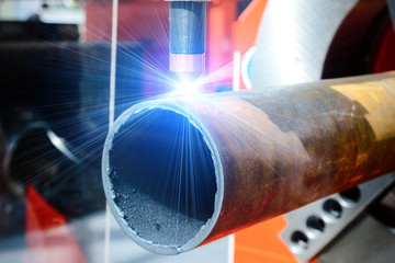 CNC plasma cutting machine for metal pipes.