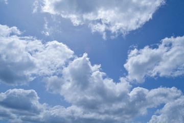 Fototapeta na wymiar White clouds in the beautiful blue sky.