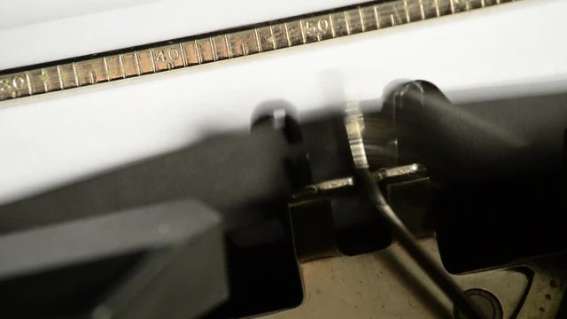 Typing the expression life before computers... with an old manual typewriter