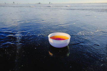 Obraz premium winter fishing on the sea the bright sun