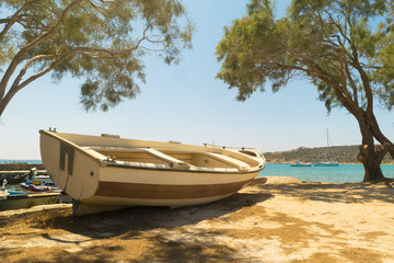 Fishing boat at Alyki beach at Paros island in Greece.
