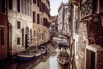 Vintage scenic Venice city. / Retro vintage view at water street in Venice, touristic attraction in Europe, italy.