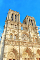 Fototapeta na wymiar Front side of Notre Dame de Paris Cathedral, most beautiful Cath