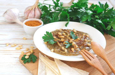 Baba ganoush - traditional arabian eggplant dip with flat bread