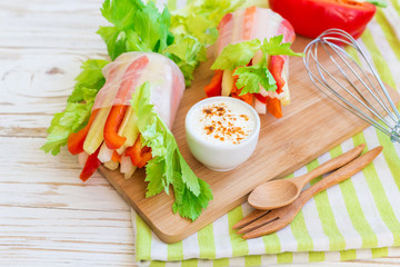 Spring roll with vegetables and white sour cream souce