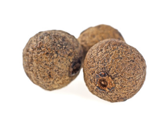 Close up of allspices (Jamaica pepper). Macro image, selective f