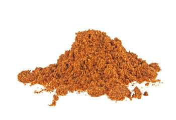 Pile of nutmeg powder isolated on white background