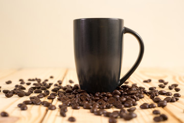 Black coffee cup with coffee bean