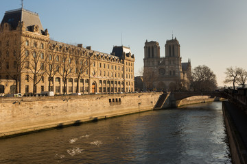 Bridges on the Seine river and passenger ships as a public transport vehicle in Paris.