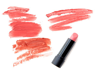 Collection of various lipstick on white background